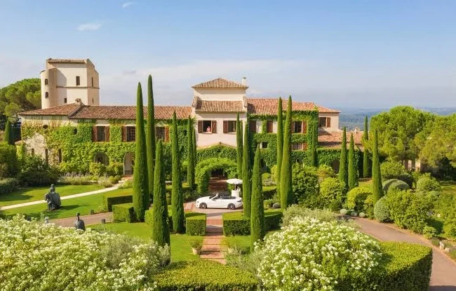 Cypress trees and landscaped gardens at Château Saint-Martin wedding venue near Nice.
