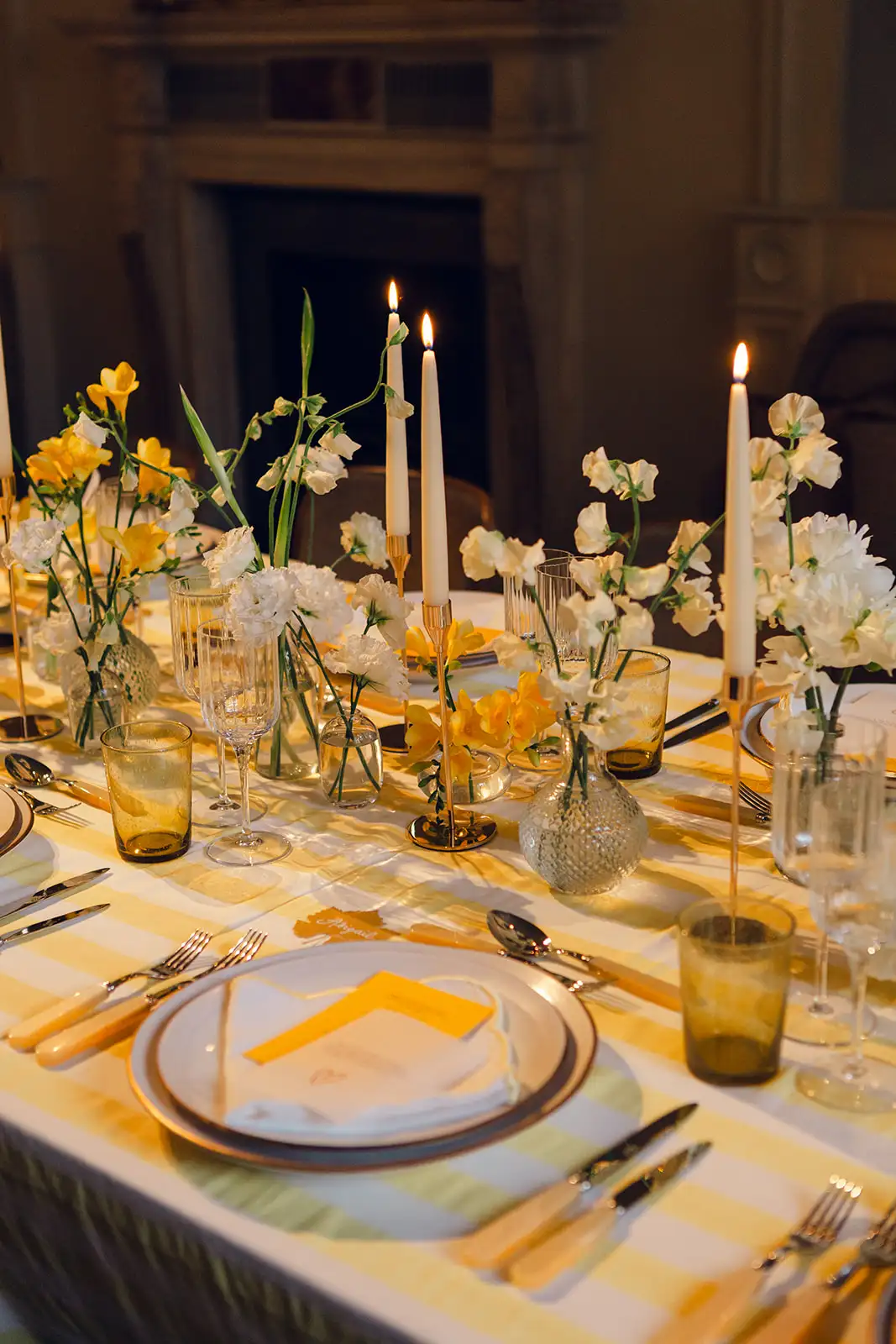 Yellow and white tablescape created by Sauveur Studios for a luxury London event.