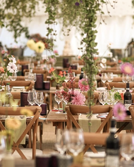 A floral ceiling design for a luxury wedding in a marquee by Sauveur Studios.